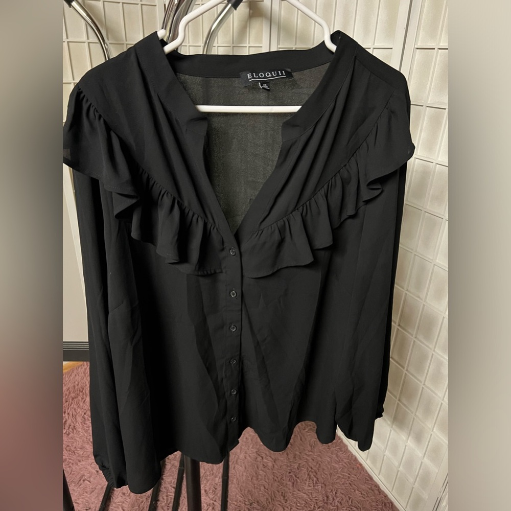 Plus sized black long sleeve top
